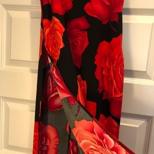 Worn a handful of times, expandable stretch waist, straight skirt w/ open side